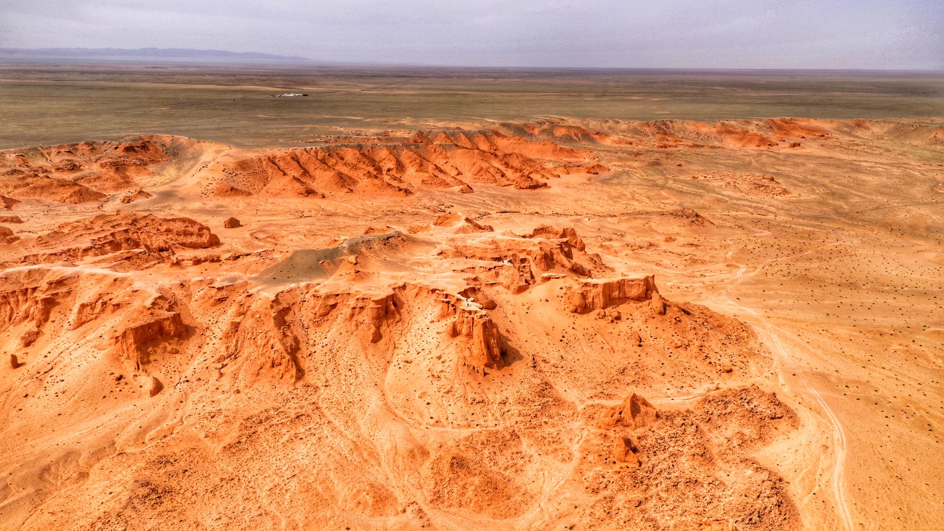 Stunning aerial photograph of the Flaming Cliffs in Bulgan, Mongolia's Gobi Desert.